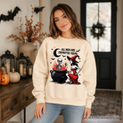 Funny Halloween sweatshirt by OrnamentallyYou with a witch design and humorous "All Men Are Cremated Equal" slogan on a cozy sweater.