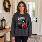 Funny Halloween sweatshirt from OrnamentallyYou featuring a witch design and the phrase "All Men Are Cremated Equal" on a cozy sweatshirt.