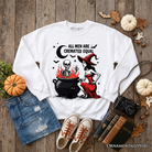Funny Halloween sweatshirt featuring a witch design and the phrase "All Men Are Cremated Equal" by OrnamentallyYou, casual unisex sweater.