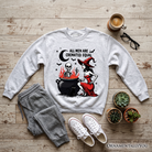 Funny Halloween sweatshirt by OrnamentallyYou featuring ash-colored fabric and witch-themed design with humorous "All Men Are Cremated Equal" slogan.