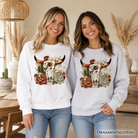 Boho floral cow skull sweatshirt by OrnamentallyYou, Western autumn cowgirl sweater with floral and skull design.