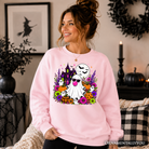 Colorful Halloween Pumpkin sweatshirt by OrnamentallyYou featuring a bubblegum ghost haunted house and floral autumn design.