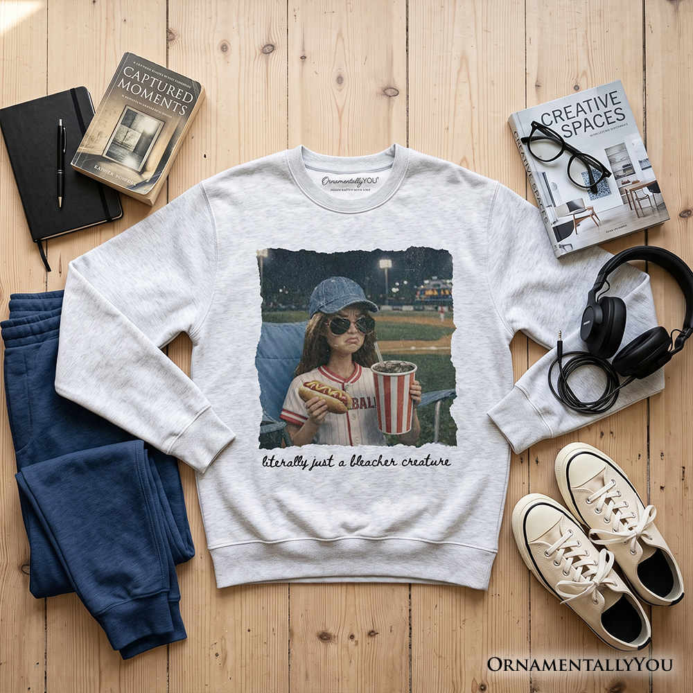 Funny doll face baseball sweatshirt by OrnamentallyYou, featuring casual sports fan mom style, in ash color with playful design.
