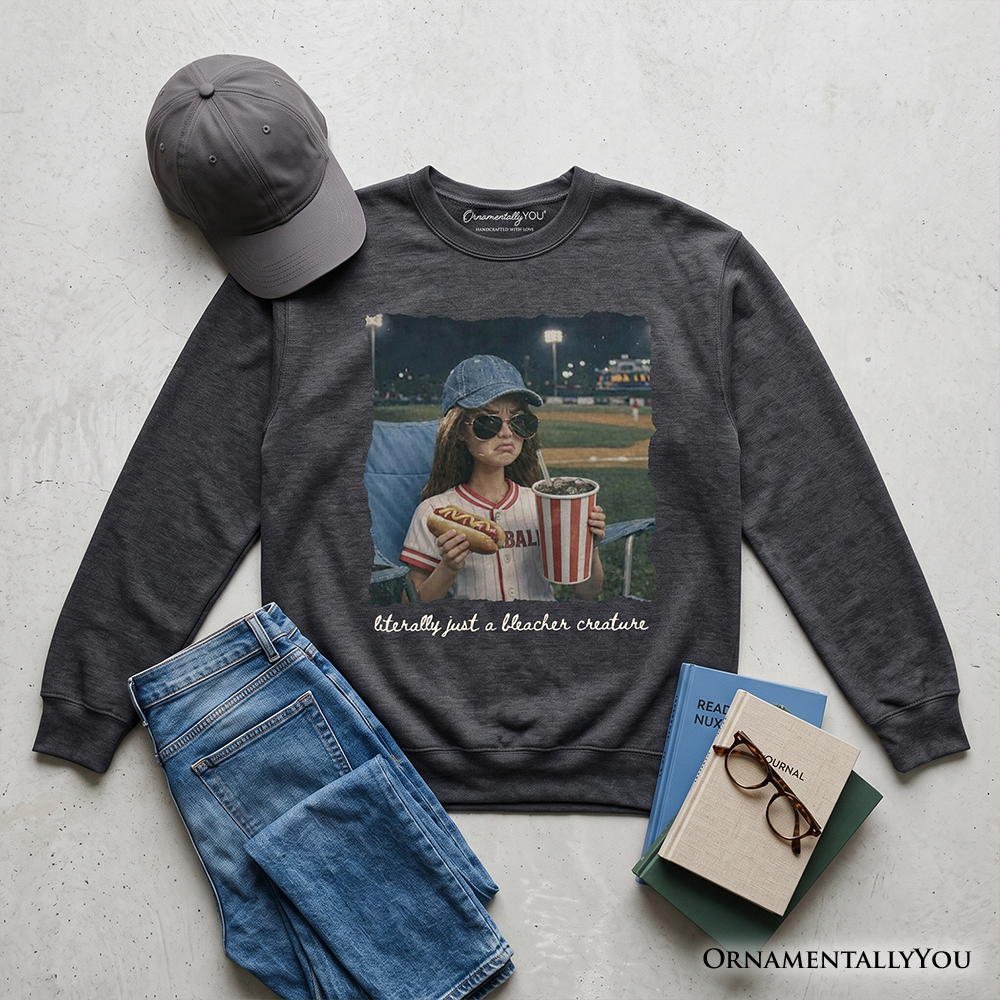 Funny doll face baseball sweatshirt by OrnamentallyYou, sports fan mom sweater with casual, comfortable fit and playful design.
