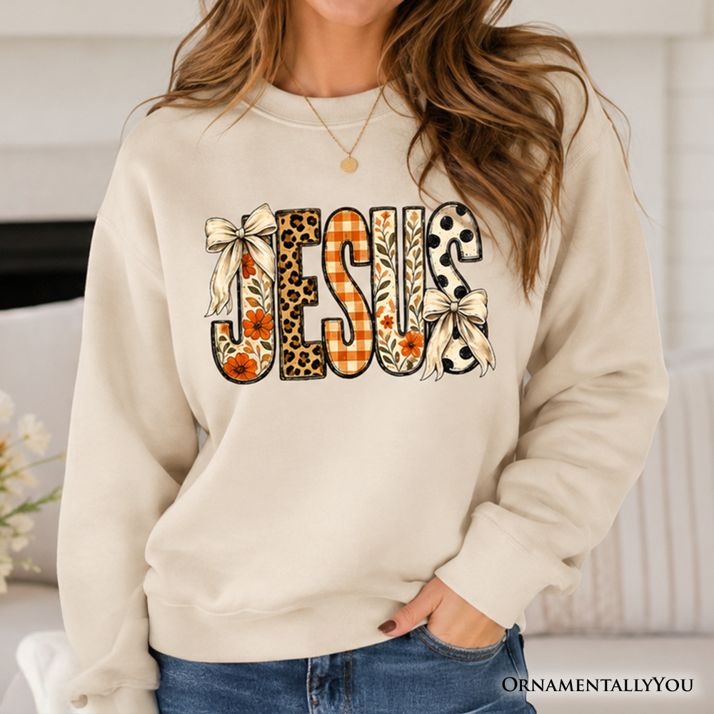 Jesus Coquette fall sweatshirt by OrnamentallyYou featuring leopard plaid floral Christian faith print on a cozy sweatshirt.