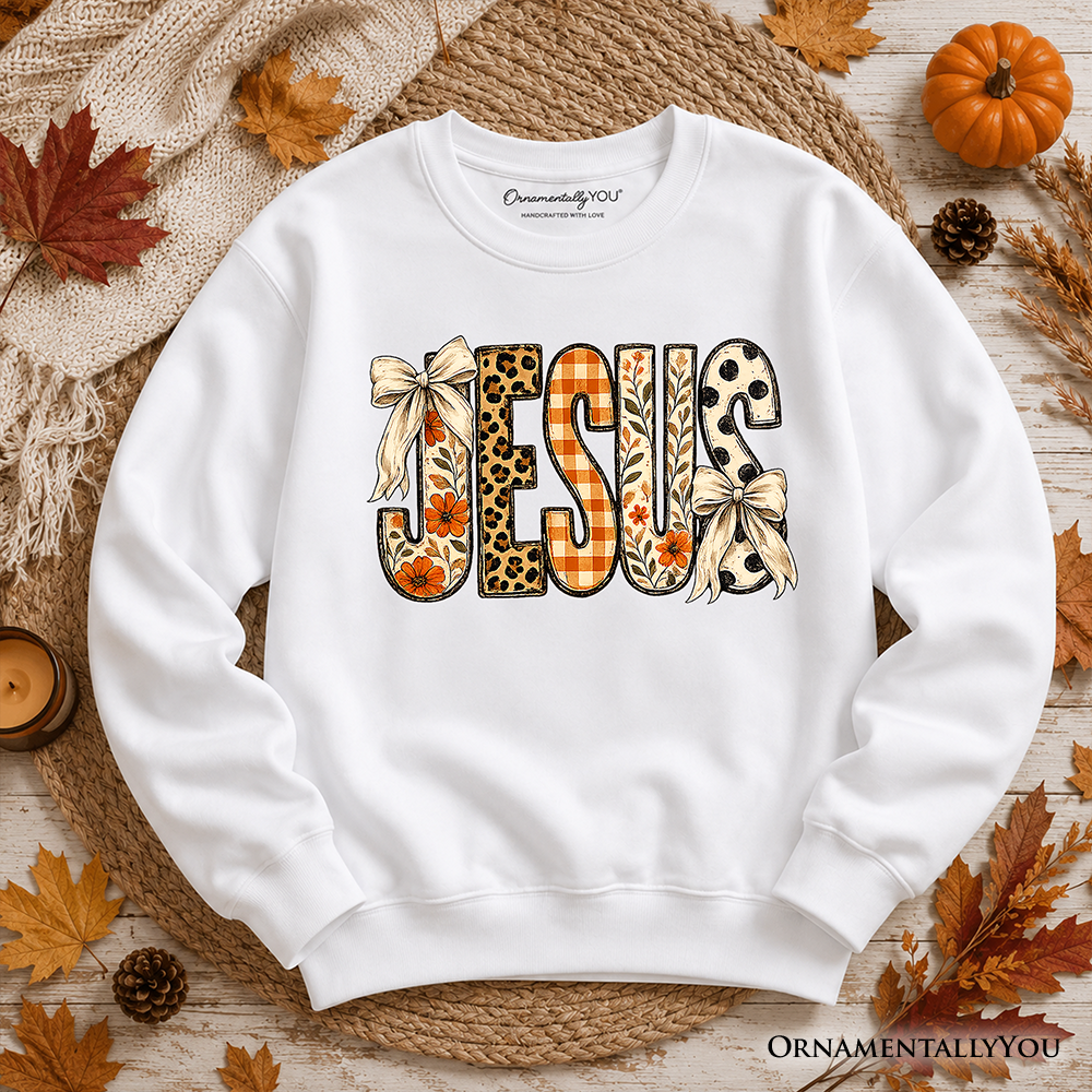 Jesus Coquette Fall Sweatshirt by OrnamentallyYou featuring leopard plaid and floral Christian faith design on a cozy sweater.
