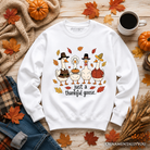Ash-colored sweatshirt featuring a humorous thankful goose design, perfect for Thanksgiving and family gatherings.