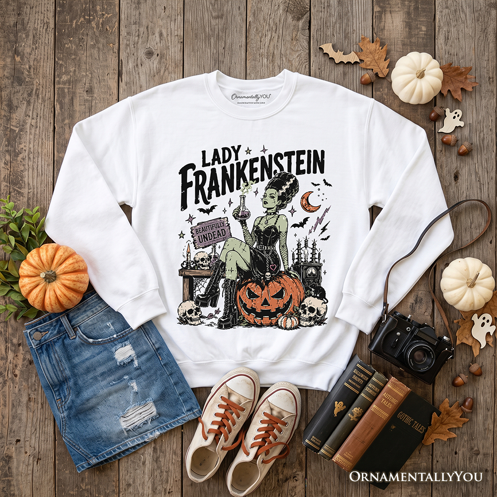 Lady Frankenstein gothic sweatshirt by OrnamentallyYou featuring vintage undead Halloween-themed design on ash-colored fabric.