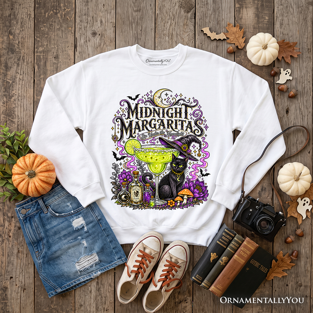 Black cat Halloween sweatshirt featuring a witchy cocktail design, perfect for spooky season, by OrnamentallyYou.
