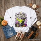 Black cat Halloween sweatshirt featuring a witchy cocktail design, perfect for spooky season, by OrnamentallyYou.