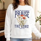 Ash-colored Christian sweatshirt with floral design and Psalm 150:6 quote, featuring religious faith theme by OrnamentallyYou.
