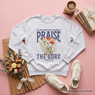 Ash-colored Christian sweatshirt by OrnamentallyYou featuring floral design and Psalm 150:6, emphasizing religious faith.