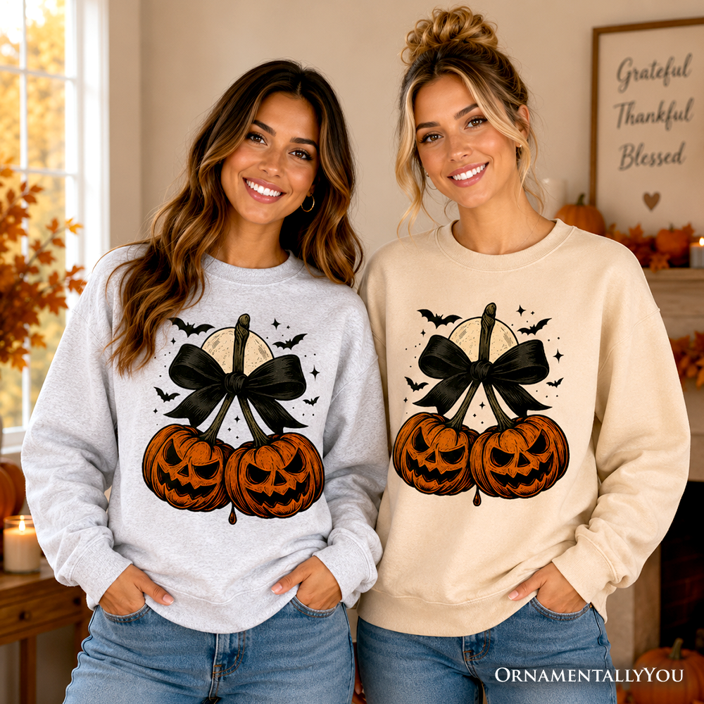 Orange and black Pumpkin Cherries Coquette Bow sweatshirt by OrnamentallyYou featuring retro Halloween fall design for girls.