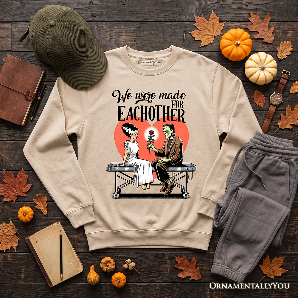 Romantic Frankenstein and Bride sweatshirt by OrnamentallyYou featuring spooky couple design on ash-colored cozy sweater.