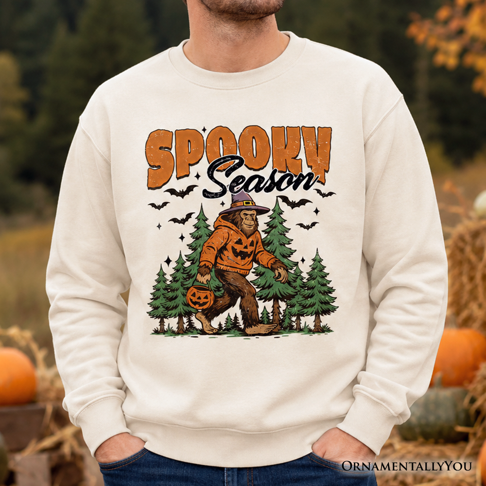 Orange Bigfoot Halloween sweatshirt with Sasquatch and pumpkin design, cozy spooky season sweatshirt by OrnamentallyYou