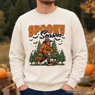 Orange Bigfoot Halloween sweatshirt with Sasquatch and pumpkin design, cozy spooky season sweatshirt by OrnamentallyYou