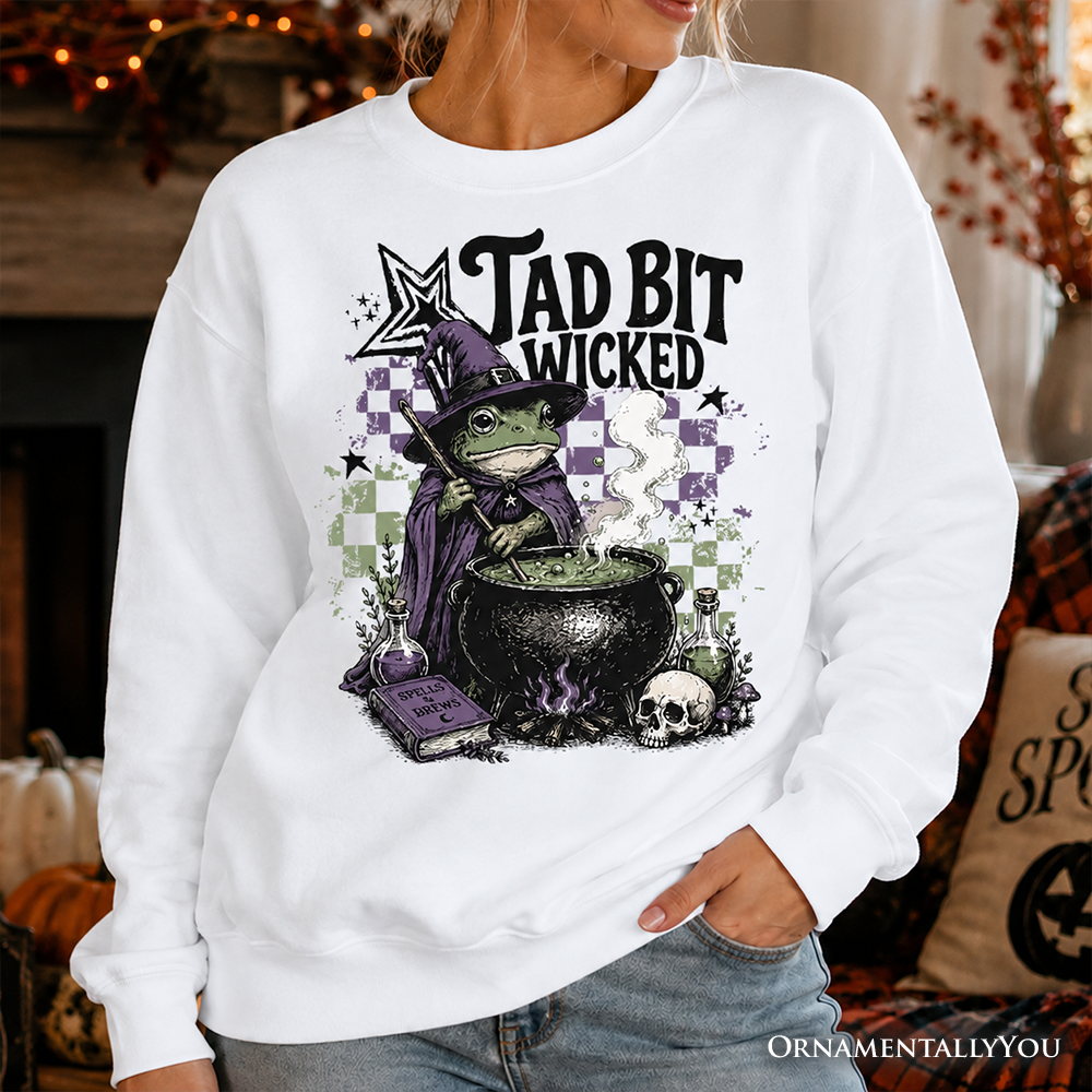 Ash gray Tad Bit Wicked Frog Witch Halloween sweatshirt by OrnamentallyYou featuring spooky cauldron and witch-themed design.