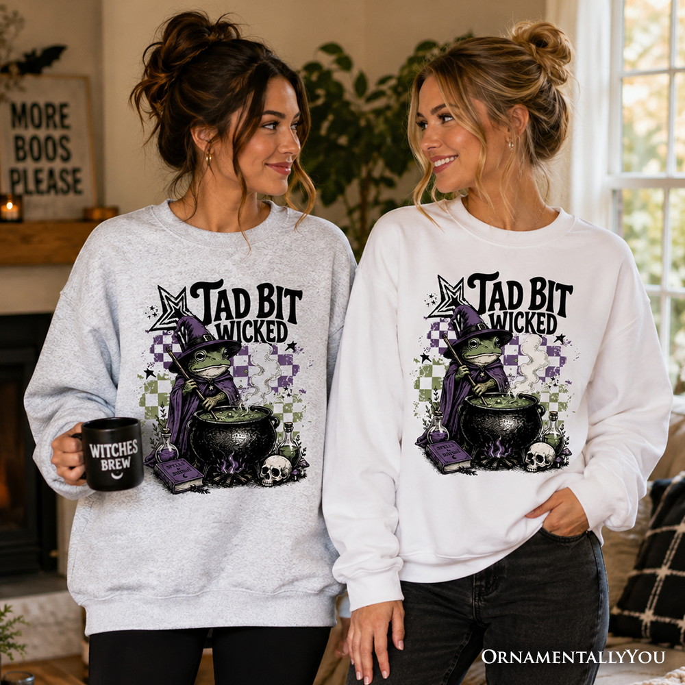 Ash gray Tad Bit Wicked Frog Witch Halloween sweatshirt with spooky cauldron design from OrnamentallyYou.