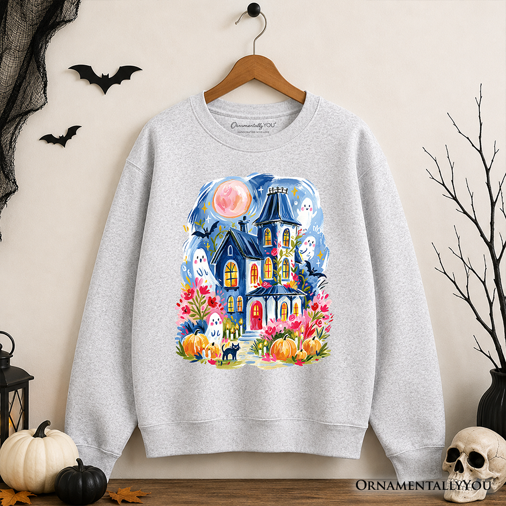 Colorful watercolor haunted house sweatshirt with ghost and pumpkin design, Halloween-themed sweatshirt by OrnamentallyYou.