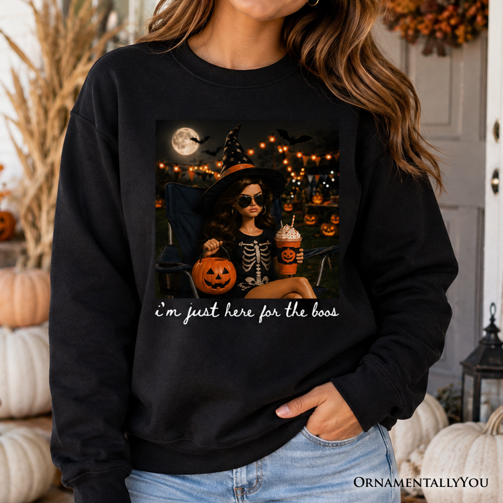 Black "I'm Just Here for the Boos" witch sweatshirt by OrnamentallyYou, featuring humorous Halloween party design and cozy fabric.