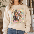 Black Lion of Judah Christian sweatshirt with floral Jesus design, featuring religious faith imagery, from OrnamentallyYou.