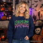 Black Mombie Halloween sweatshirt by OrnamentallyYou featuring spooky, funny mom-themed design, perfect for Halloween costumes or casual wear.