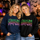 Black Mombie Halloween sweatshirt by OrnamentallyYou featuring spooky mummy design, cozy and humorous sweater for moms.
