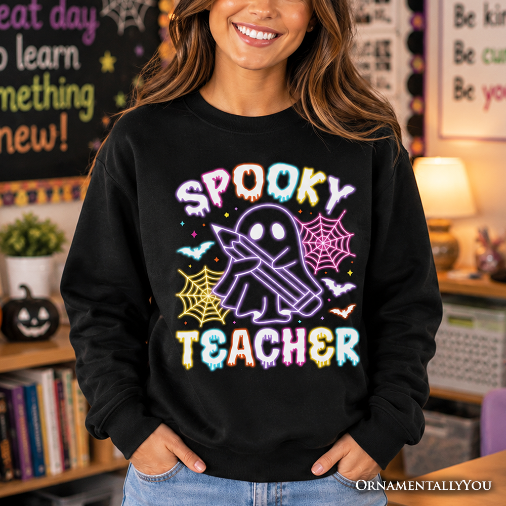 Black spooky teacher neon ghost sweatshirt by OrnamentallyYou, featuring retro Halloween ghost design for educators.