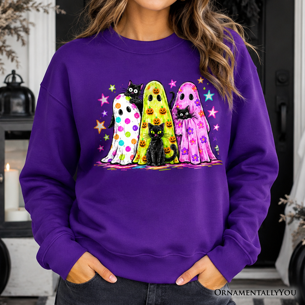 Colorful ghosts and black cats Halloween sweatshirt by OrnamentallyYou, featuring neon spooky season design on Carolina blue fabric.