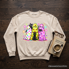 Colorful ghosts and black cats Halloween sweatshirt by OrnamentallyYou, neon spooky season sweater on Carolina blue background.