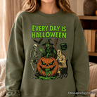 Dark heather sweatshirt featuring vintage pumpkin and witch design, perfect for Halloween lovers, by OrnamentallyYou.