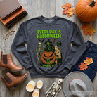 Dark heather sweatshirt featuring a vintage pumpkin witch design, perfect for Halloween and spooky season enthusiasts.