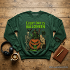 Dark heather sweatshirt featuring vintage pumpkin and witch spooky Halloween design, perfect for spooky season enthusiasts.
