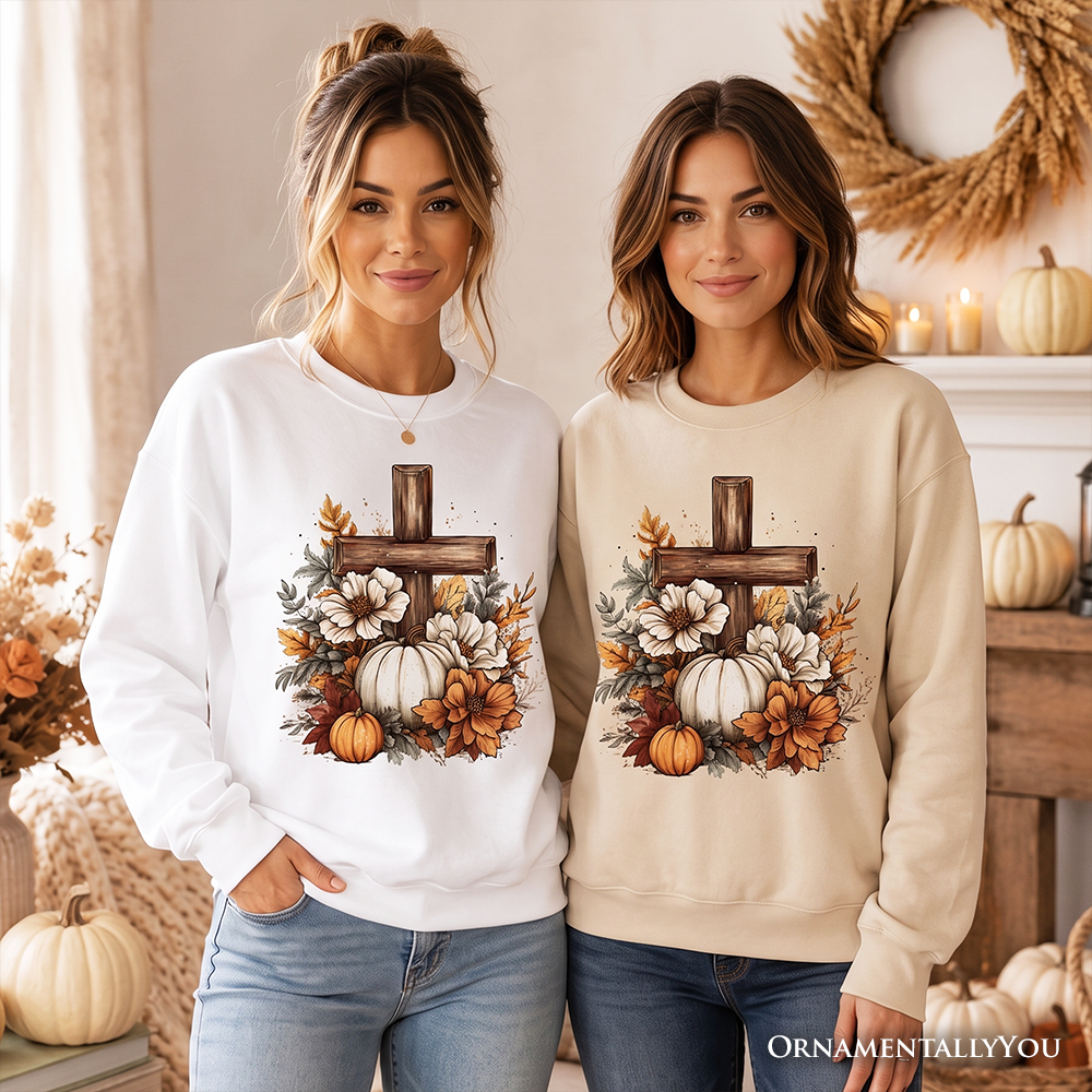 Christian Floral Pumpkin Cross sweatshirt by OrnamentallyYou featuring boho religious fall design, cozy sweatshirt with floral and pumpkin motifs.