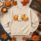 Cute fall characters sweatshirt by OrnamentallyYou featuring pumpkin, ghost, leaf, and pie designs for autumn style.