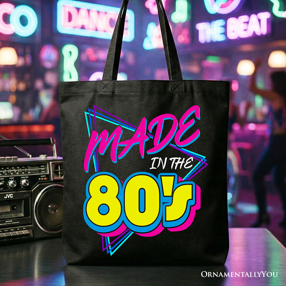 Black Made In The 80s tote bag by OrnamentallyYou featuring neon retro eighties kid design, perfect for gift or shopping.