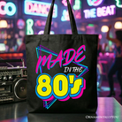 Black Made In The 80s tote bag by OrnamentallyYou featuring neon retro eighties kid design, perfect for gift or shopping.