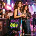Black Made In The 80s tote bag by OrnamentallyYou with neon retro eighties design, perfect for casual shoppers and retro style fans.