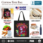 Black tote bag featuring a sugar skull girl design with Mexican margarita and sombrero motifs, perfect for Cinco de Mayo celebrations.
