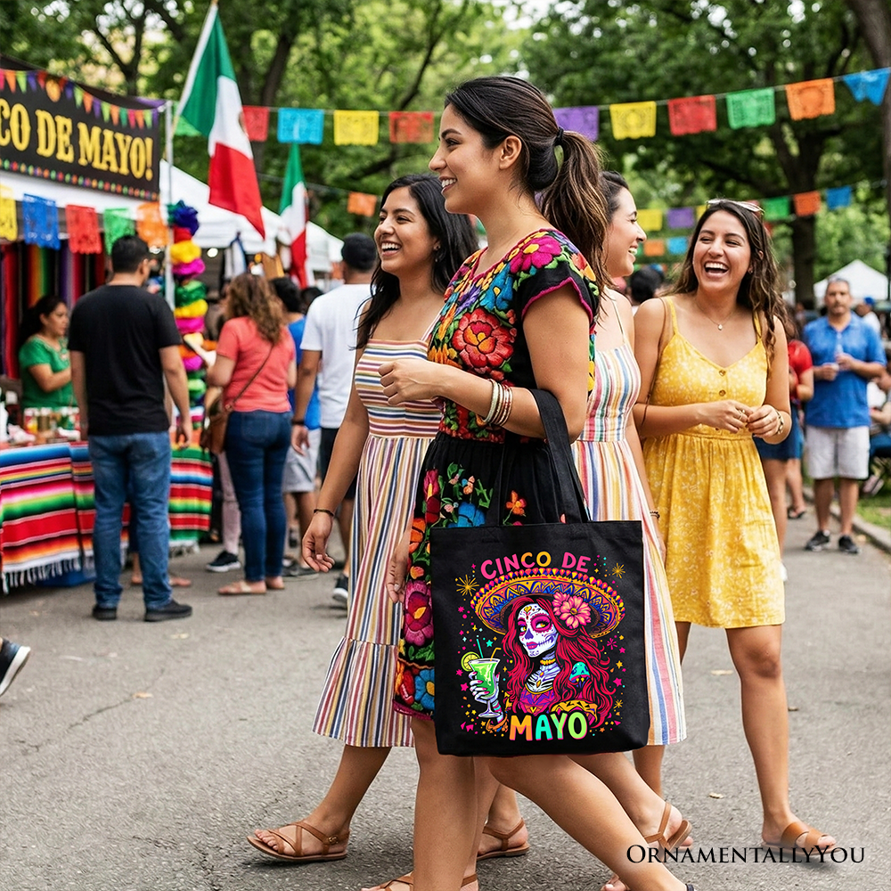 Black tote bag featuring a sugar skull girl design with Cinco de Mayo theme, Mexican margarita, and sombrero illustration.