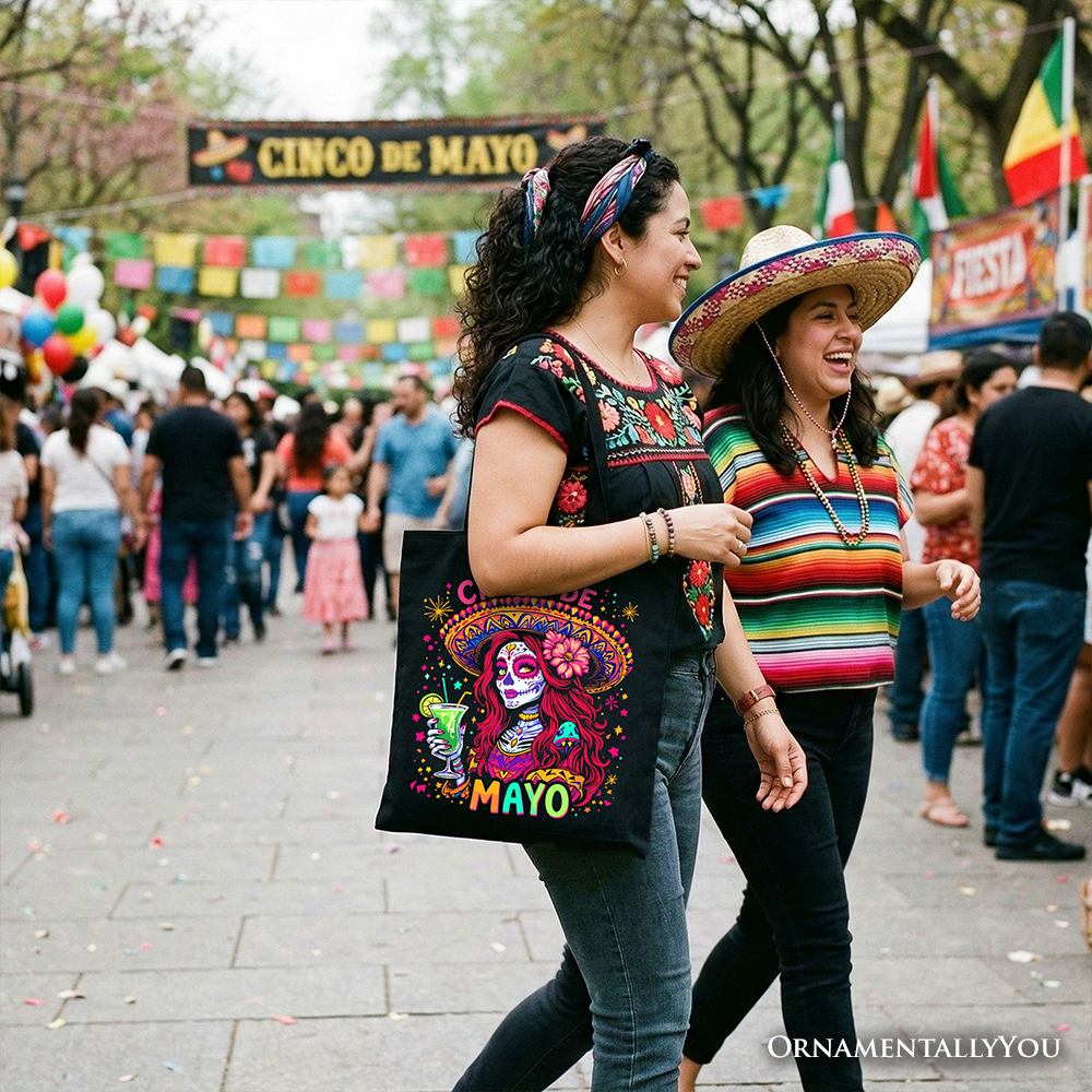 Black tote bag featuring a sugar skull girl design with Cinco de Mayo and Mexican margarita motifs, perfect for festive occasions.