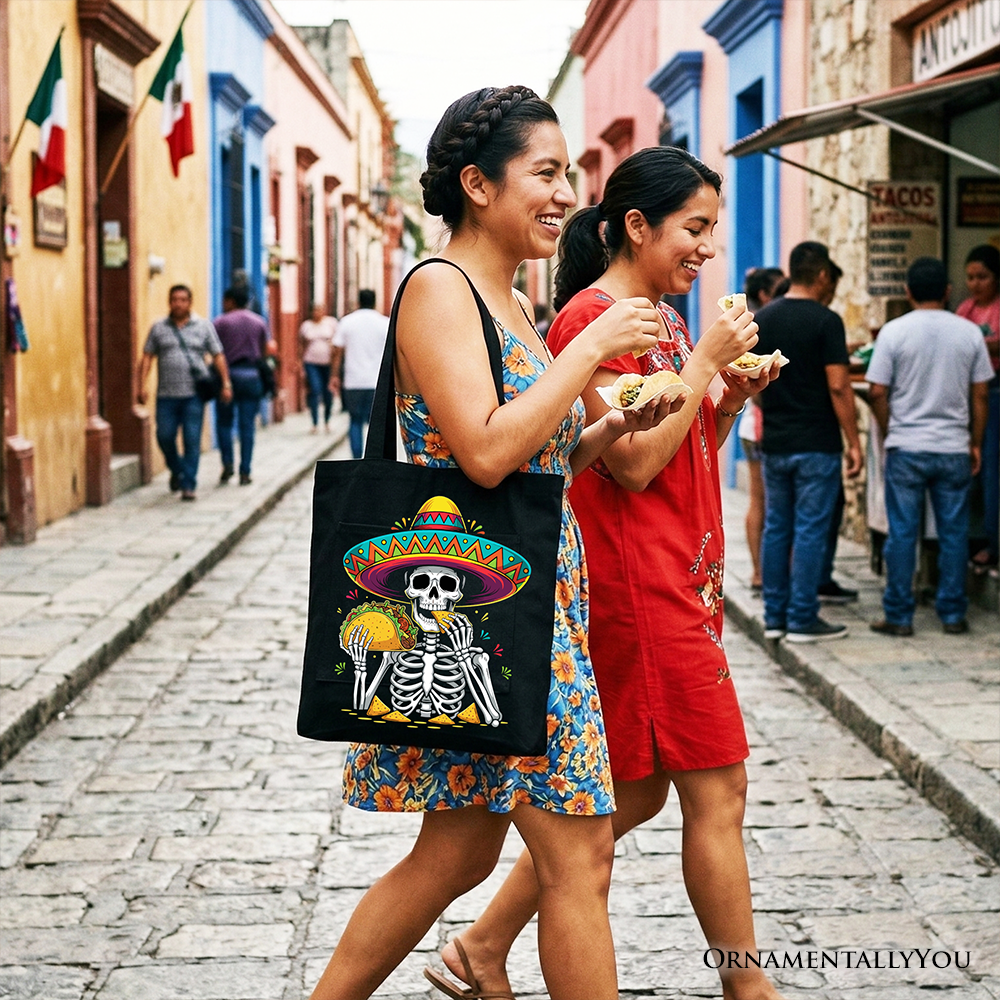 Black tote bag featuring a taco skeleton with a Mexican skull and sombrero, perfect for Cinco de Mayo celebrations.