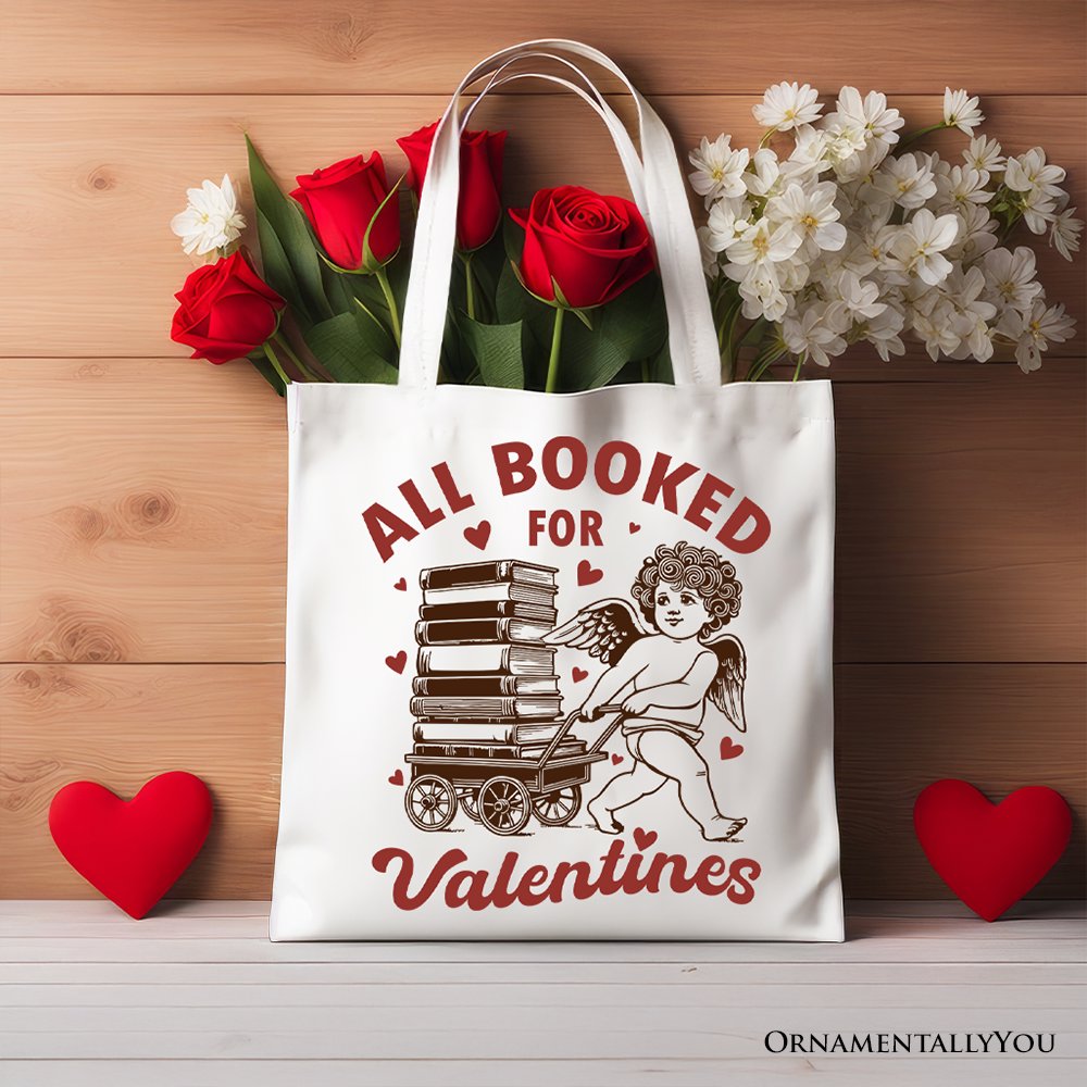 White canvas tote bag featuring "All Booked For Valentines" Cupid design, vintage funny bookworm gift by OrnamentallyYou.