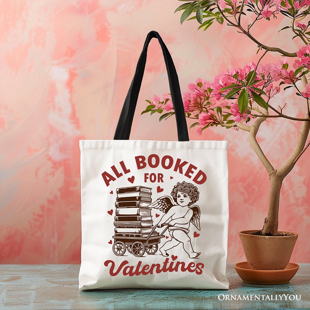 White canvas tote bag featuring "All Booked For Valentines" Cupid design, vintage funny bookworm gift by OrnamentallyYou.