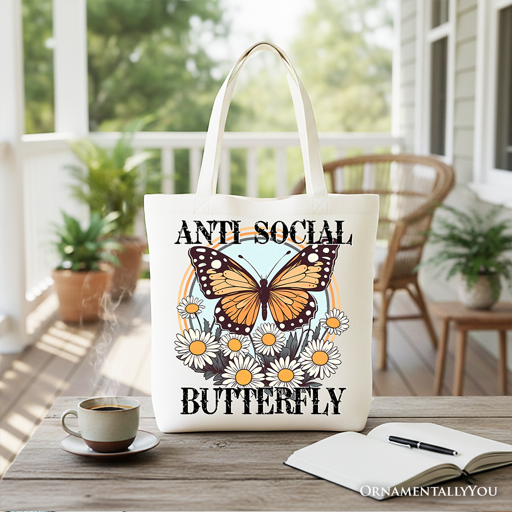 White canvas tote bag with anti-social butterfly graphic, stylish and quirky, perfect for independent women.