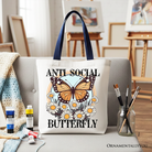 White Anti Social Butterfly canvas tote bag by OrnamentallyYou, featuring retro design, perfect for quirky, independent women.
