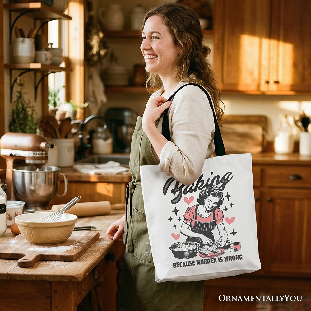 White tote bag by OrnamentallyYou with humorous "Baking Because Murder Is Wrong" design, perfect for kitchen or shopping use.