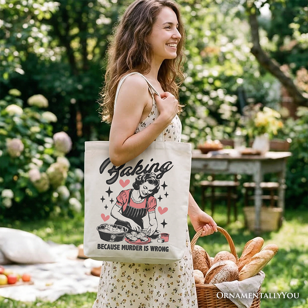 White tote bag featuring humorous "Baking Because Murder Is Wrong" design, perfect for kitchen or shopping use by OrnamentallyYou.