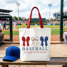 White tote bag with "Baseball Is My Favorite Season" text and a Coquette bow design, perfect for game day or casual use.