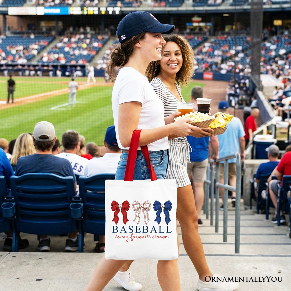 White tote bag with "Baseball Is My Favorite Season" text, featuring a coquette bow and game day theme, by OrnamentallyYou.